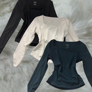 Stylish Long Sleeve Tops - Black, White, and Cyan
